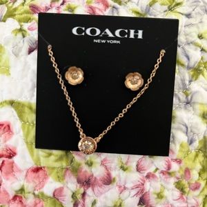 Rose gold coach, earring, and necklace set